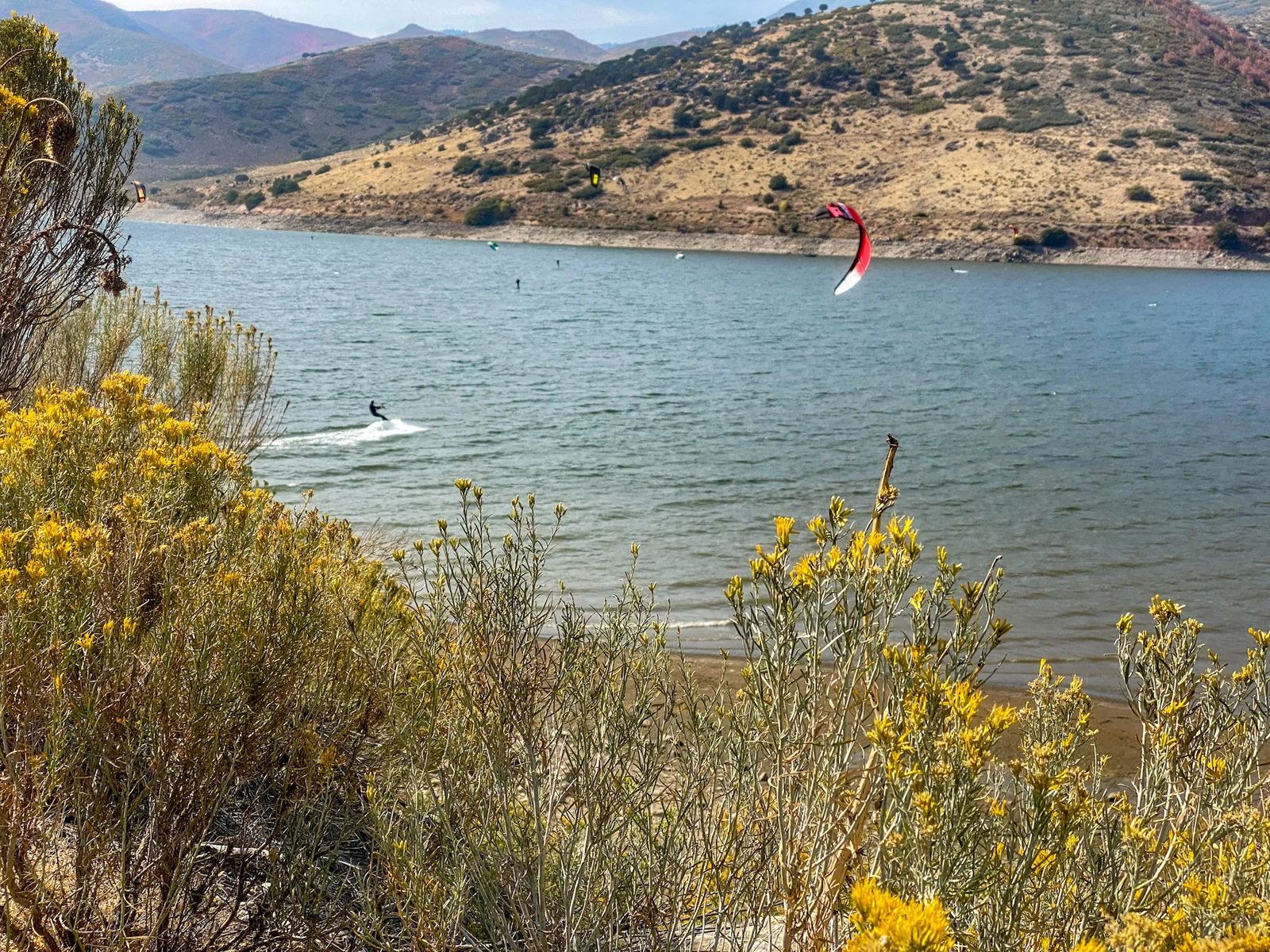 surfer at deer creek reservoir with fall colors