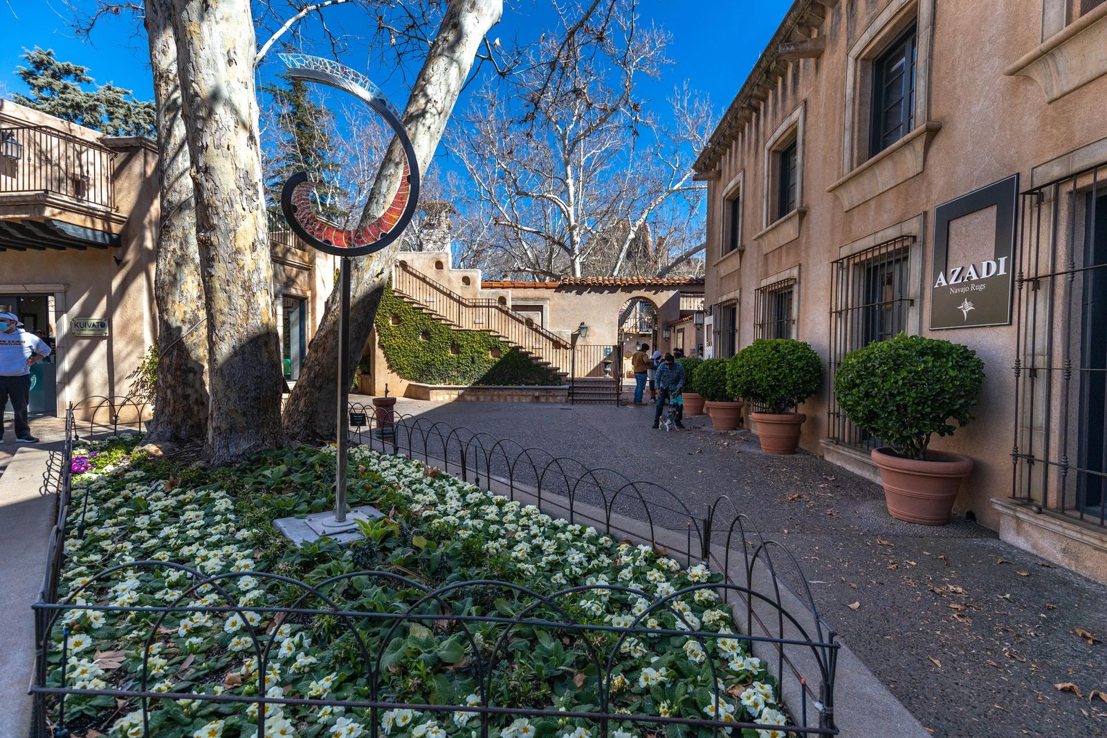 Artistic metal sculpture in flower bed - Things to do in Sedona