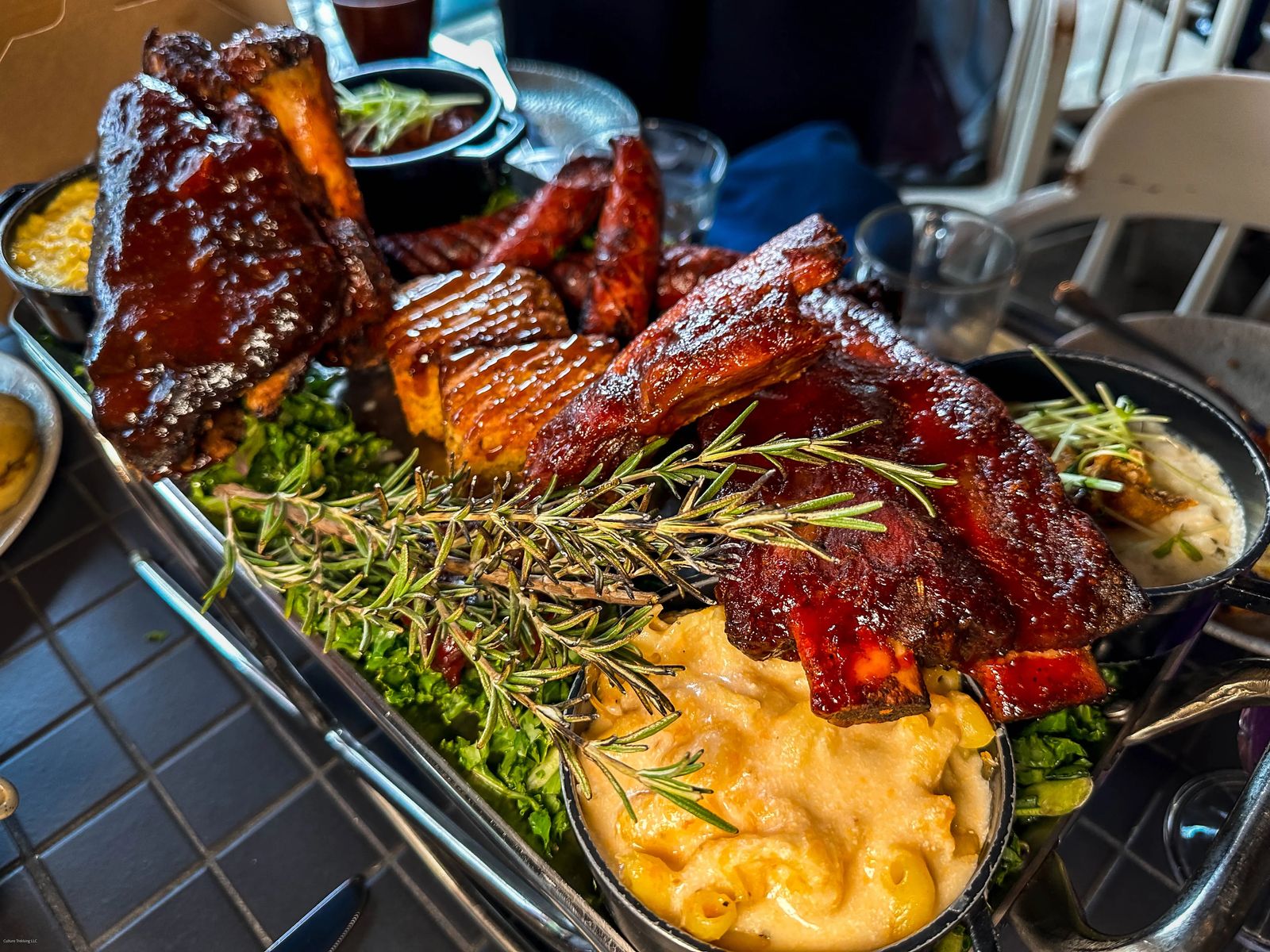 BBQ family meal with potatoes and Mac and cheese