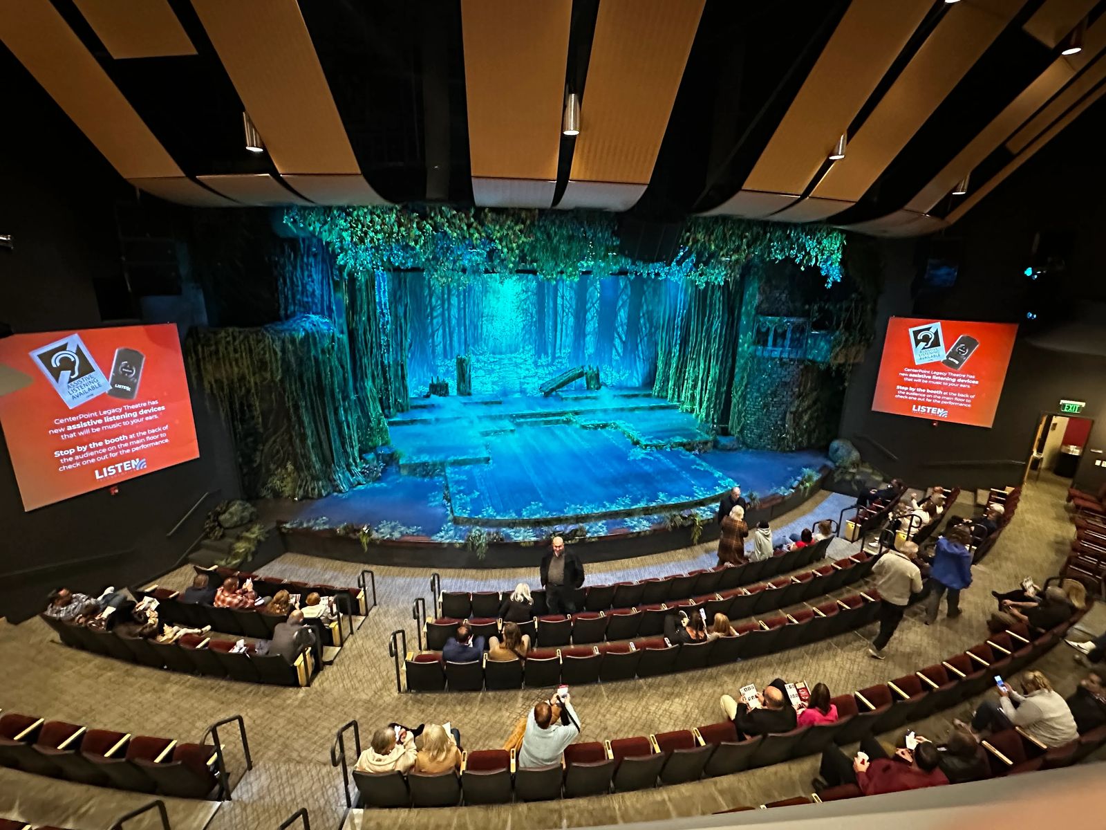 Theatre with woods on stage with mist