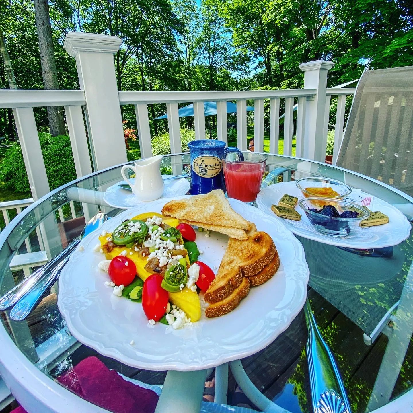 Full breakfast with toast, omlette, fiddle stems tomatoes and feta cheese at Hawthorn Inn