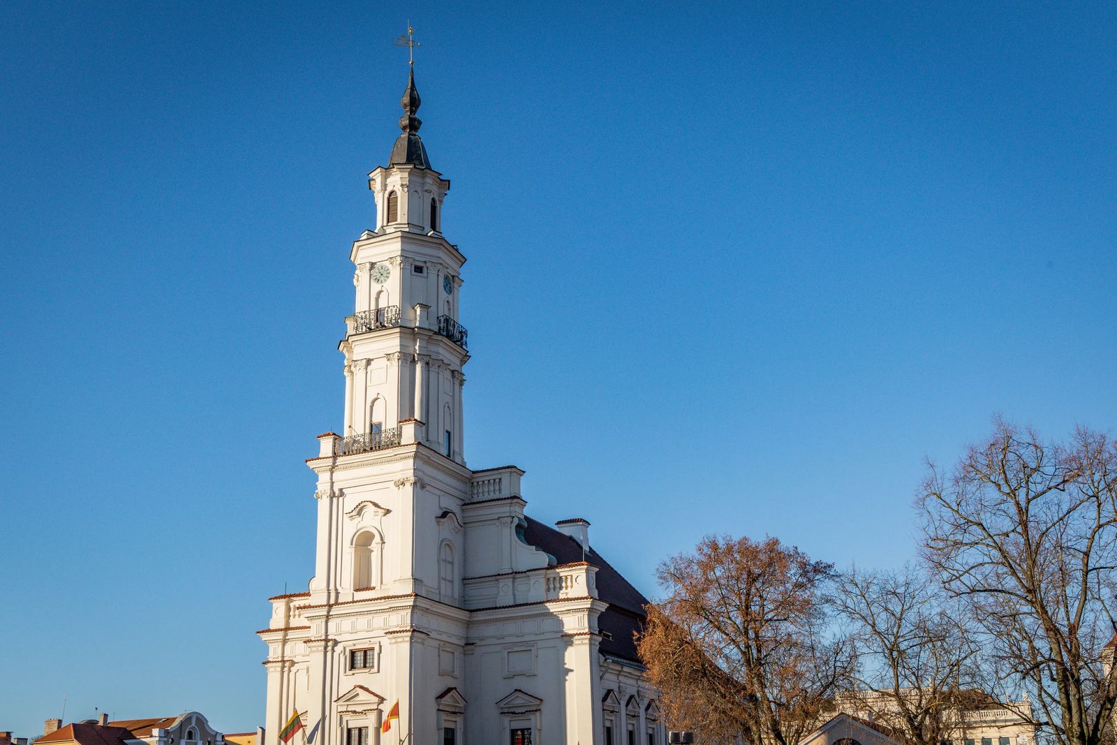 Things to do in Kaunas - town hall with massive bell tower at sunset