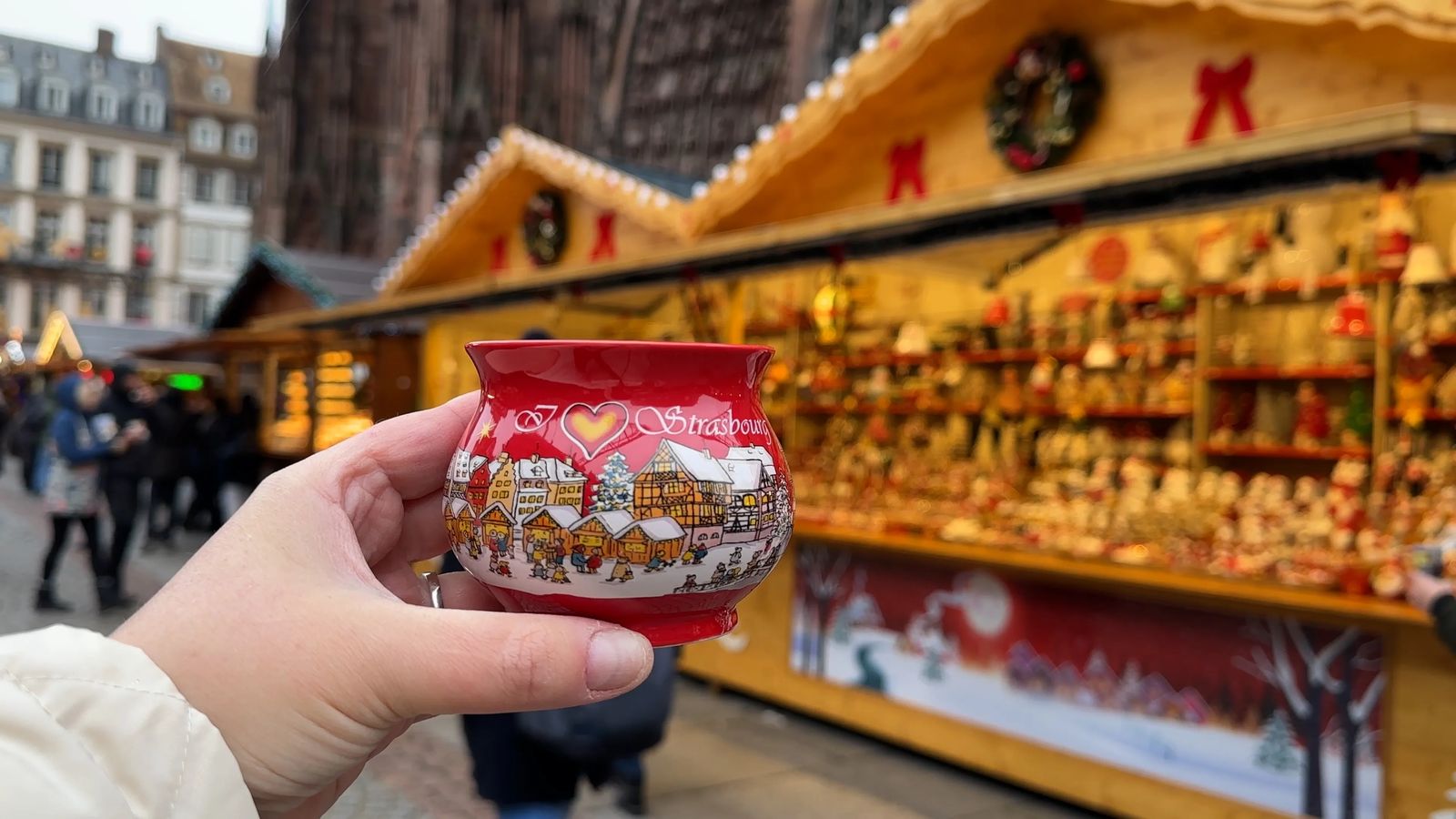 Strasbourg Christmas mug in front of Christmas Chalet - Best Things To See In Strasbourg France